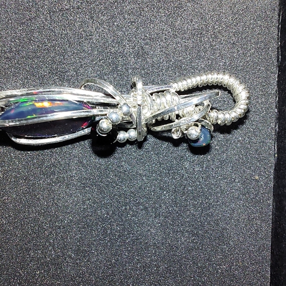 Sterling silver wire wrapped genuine black faceted Ethiopian opal pendant - Picture 9 of 9